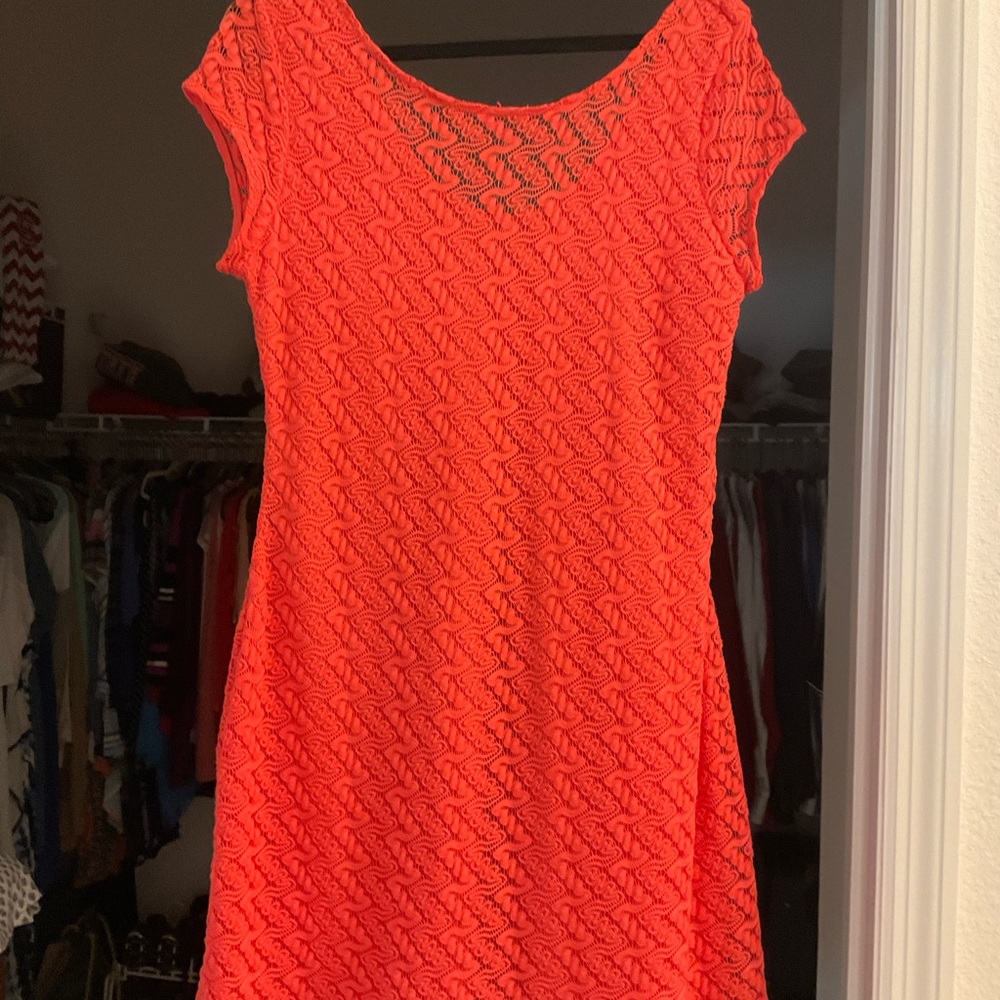 Bright orange crochet dress
